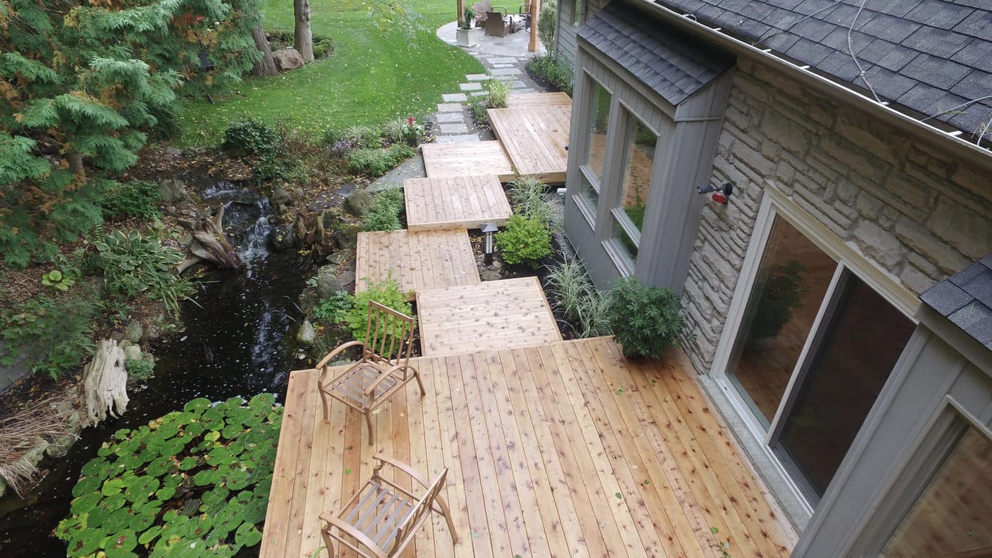 Maybe its the tranquilty and privacy of a backyard stream and Koi Pond to sooth the sole.