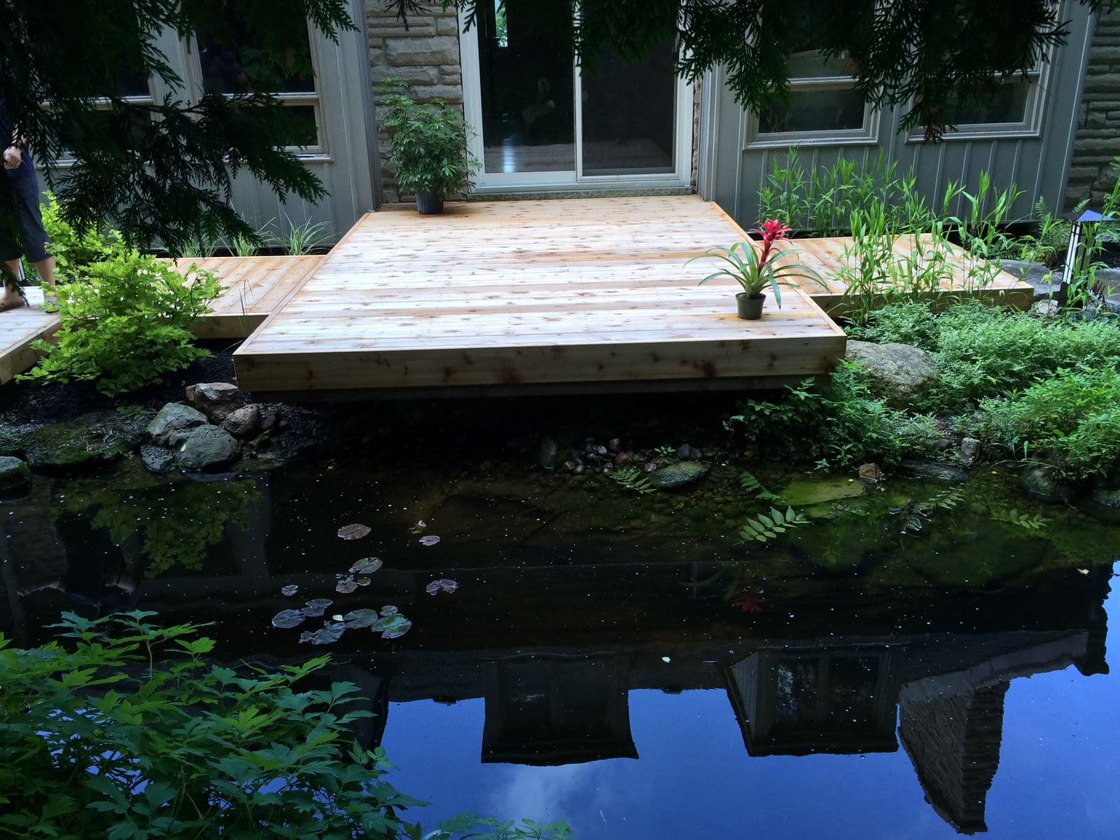 Cantilevered deck over koi pond