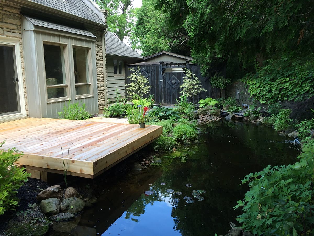 Koi pond and deck built by Stellar Landscapes
