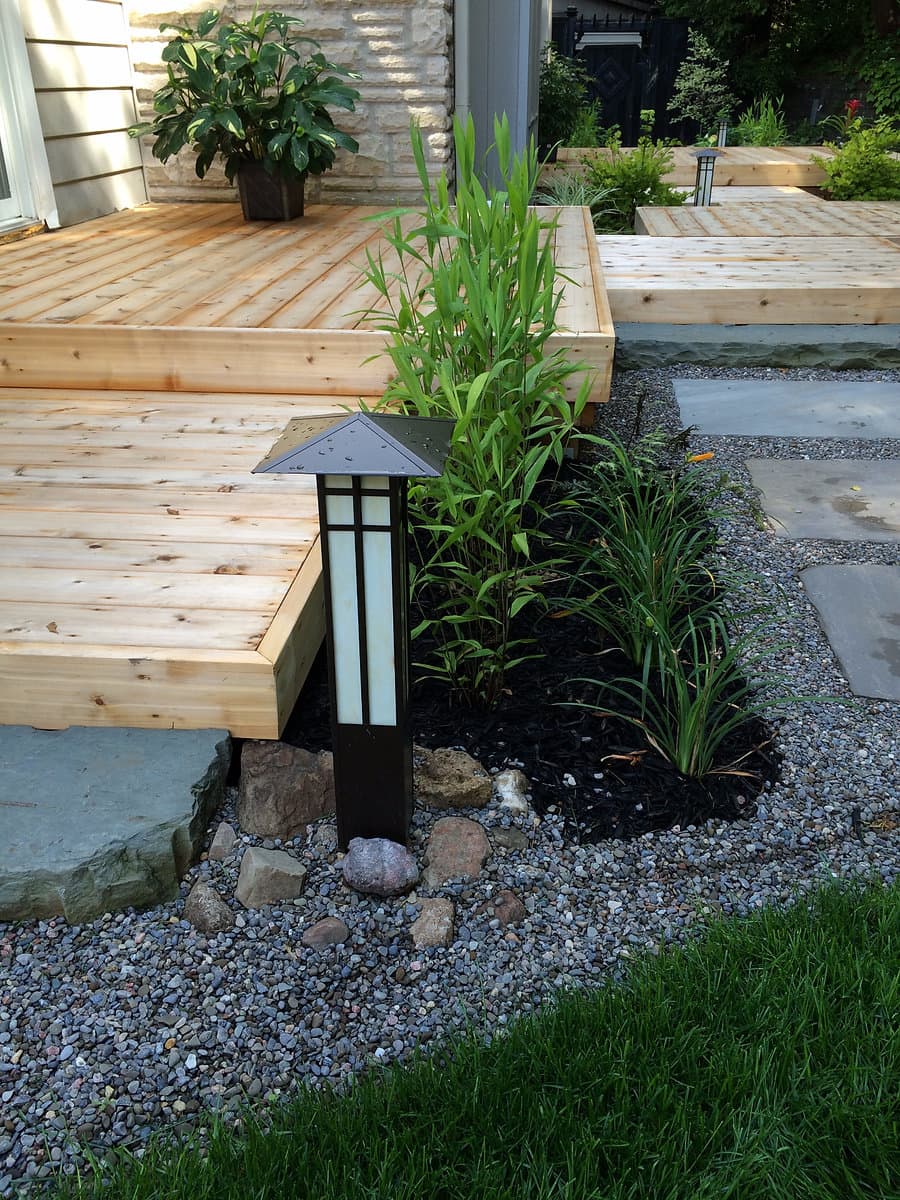 LED-lit stone pathway at dusk by Stellar Landscapes